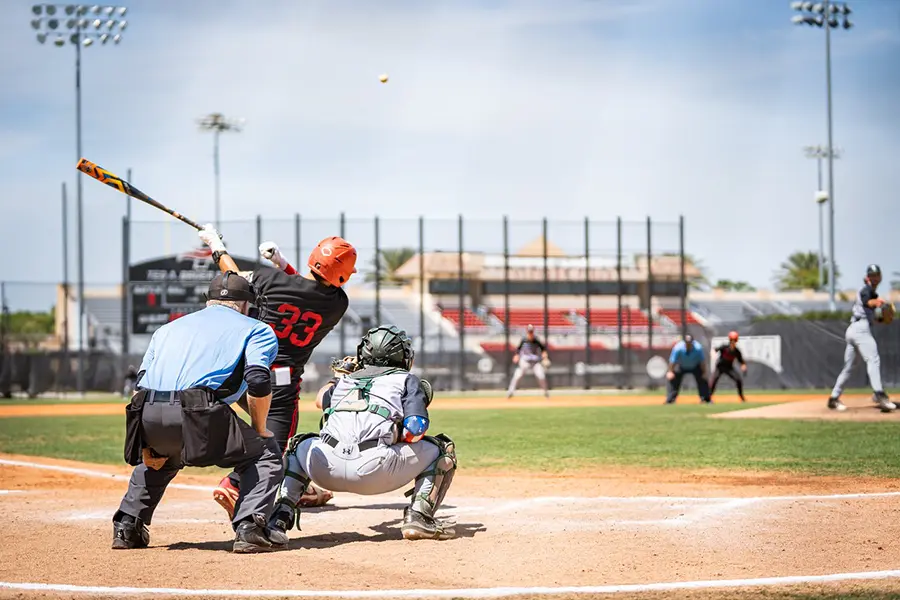 Player Hitting Ball